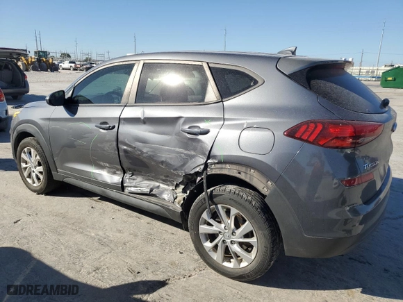 2019 Hyundai Tucson SE with VIN KM8J23A41KU945578, listed as a Copart auction lot 77248584 with 69,359 mi miles and Salvage Title. Bid and sale history available at carsss.com. Image 2.