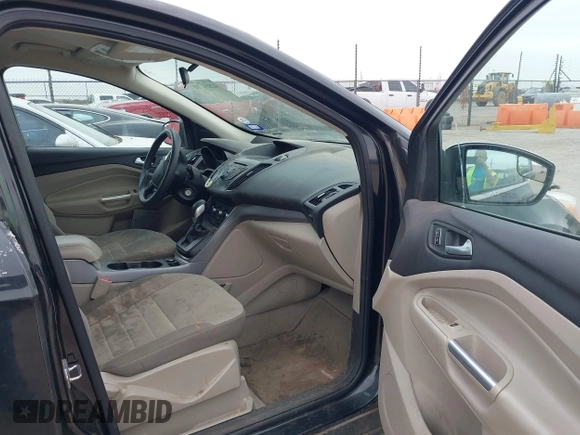 2015 Ford Escape SE with VIN 1FMCU9G90FUA54163, listed as a IAAI auction lot 42058788 with 130,623 mi miles. Bid and sale history available at carsss.com. Image 5.