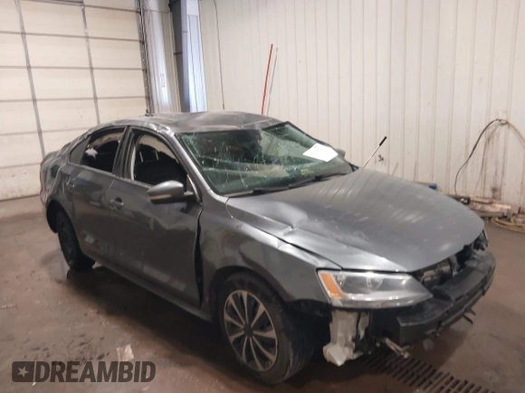 2014 Volkswagen Jetta SE with VIN 3VWD17AJ9EM206448, listed as a IAAI auction lot 42230731 with 144,159 mi miles and . Bid and sale history available at DreamBid. Image 6.