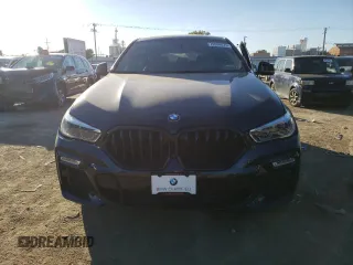 2020 BMW X6 xDrive40i z VIN 5UXCY6C03L9D00816, wystawiony jako Copart lot #76538674 z przebiegiem Nie podano mil oraz Szkoda całkowita • Salvage title. Historia ofert i sprzedaży dostępna na DreamBid. Obrazek 5.