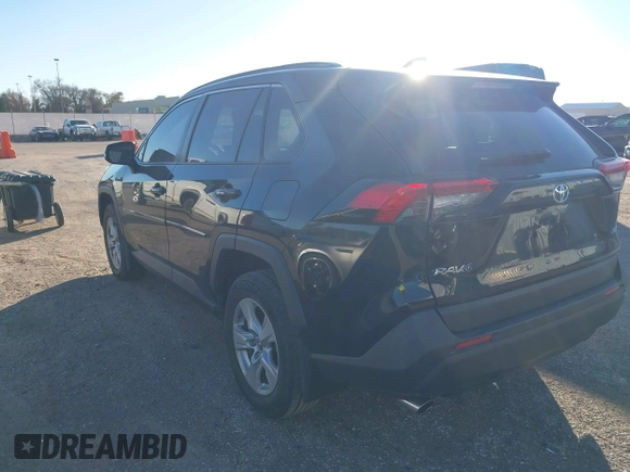 2019 Toyota RAV4 XLE with VIN JTMW1RFV1KD002799, listed as a IAAI auction lot 40887562 with 75,016 mi miles. Bid and sale history available at carsss.com. Image 3.