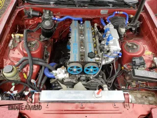 1987 Toyota Supra z VIN JT2MA70J6H0060238, wystawiony jako Copart lot #84754334 z przebiegiem 201 761 mil mil oraz Czysty tytuł • Clean title. Historia ofert i sprzedaży dostępna na DreamBid. Obrazek 11.