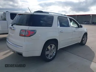2014 GMC Acadia Denali z VIN 1GKKRTKD7EJ226915, wystawiony jako IAAI lot #41585231 z przebiegiem 146 847 mil mil oraz . Historia ofert i sprzedaży dostępna na DreamBid. Obrazek 4.