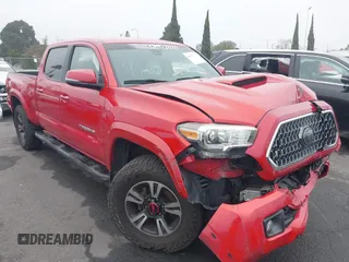 2018 Toyota Tacoma SR5 with VIN 3TMBZ5DN6JM015750, listed as a IAAI auction lot 41432507 with 114,643 mi miles and . Bid and sale history available at DreamBid. Image 1.