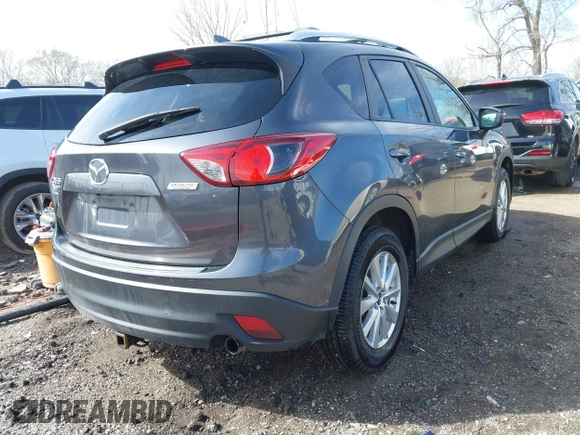 2016 Mazda CX-5 Touring with VIN JM3KE4CY9G0915305, listed as a IAAI auction lot 41840519 with 188,702 mi miles and . Bid and sale history available at carsss.com. Image 4.