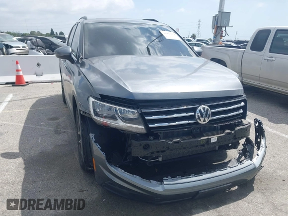 2020 Volkswagen Tiguan SE with VIN 3VV3B7AX9LM061569, listed as a IAAI auction lot 41902252 with 33,079 mi miles and . Bid and sale history available at DreamBid. Image 1.