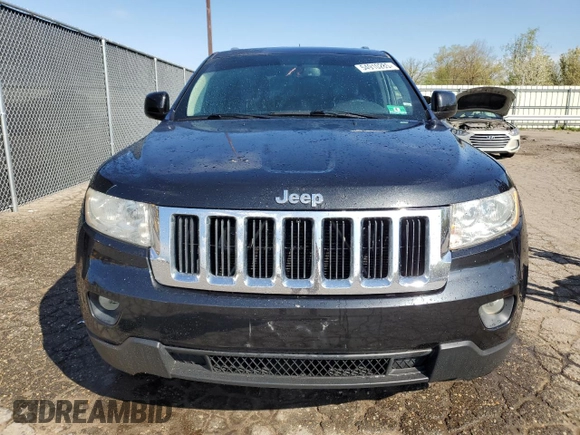 2012 Jeep Grand Cherokee Laredo with VIN 1C4RJFAG4CC203267, listed as a Copart auction lot 54910285 with 143,289 mi miles and Clean Title. Bid and sale history available at carsss.com. Image 5.