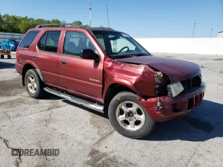 2003 Isuzu Rodeo z VIN 4S2DM58W634305399, wystawiony jako Copart lot #55258335 z przebiegiem 223 105 mil mil oraz Szkody całkowita. Historia ofert i sprzedaży dostępna na DreamBid. Obrazek 4.