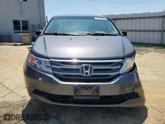 2012 Honda Odyssey LX z VIN 5FNRL5H2XCB147224, wystawiony jako Copart lot #59165425 z przebiegiem 214 730 mil mil oraz Szkoda całkowita • Salvage title. Historia ofert i sprzedaży dostępna na DreamBid. Obrazek 5.