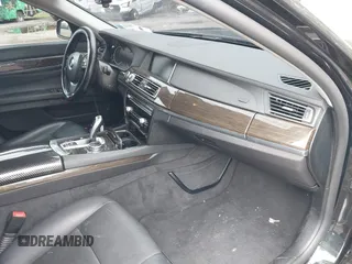 2015 BMW 7 Series 740Li xDrive with VIN WBAYF4C55FG291723, listed as a IAAI auction lot 42694382 with 101,140 mi miles and . Bid and sale history available at DreamBid. Image 5.