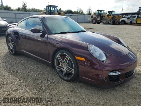 2007 Porsche 911 Turbo z VIN WP0AD29977S785167, wystawiony jako Copart lot #73803074 z przebiegiem 18 960 mil mil oraz Szkoda całkowita • Salvage title. Historia ofert i sprzedaży dostępna na DreamBid. Obrazek 4.