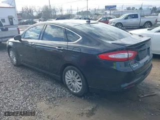 2014 Ford Fusion Energi Titanium with VIN 3FA6P0SU5ER269923, listed as a IAAI auction lot 41086950 with 135,351 mi miles. Bid and sale history available at carsss.com. Image 3.