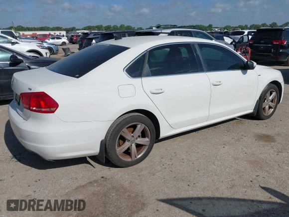 2014 Volkswagen Passat Wolfsburg Edition with VIN 1VWAS7A30EC053025, listed as a IAAI auction lot 42579059 with 168,446 mi miles and . Bid and sale history available at DreamBid. Image 4.