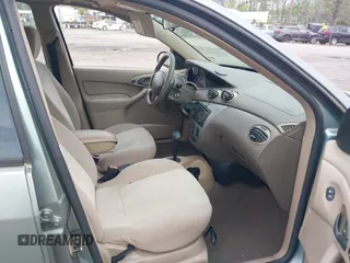 2004 Ford Focus ZTS with VIN 1FAFP38Z74W117402, listed as a IAAI auction lot 42035928 with 113,393 mi miles and . Bid and sale history available at carsss.com. Image 5.
