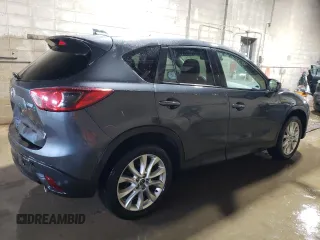2015 Mazda CX-5 Grand Touring with VIN JM3KE4DY1F0454713, listed as a Copart auction lot 48548285 with 132,454 mi miles and Salvage Title. Bid and sale history available at DreamBid. Image 3.