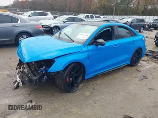 2024 Audi RS 3 z VIN WUAG4DGY9RA902002, wystawiony jako IAAI lot #41061998 z przebiegiem 21 276 mil mil oraz . Historia ofert i sprzedaży dostępna na DreamBid. Obrazek 2.