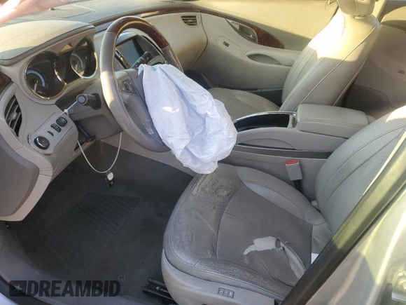 2012 Buick LaCrosse Touring с VIN 1G4GJ5E35CF131532, выставлен на аукционе Copart как лот 81626724 с пробегом 163 571 миль миль и Списание • Salvage title. История ставок и продаж доступна на DreamBid. Изображение 7.