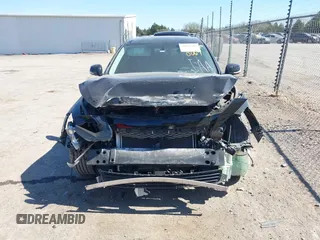 2015 Infiniti Q50 Premium with VIN JN1BV7AP9FM348009, listed as a IAAI auction lot 41852281 with 124,118 mi miles. Bid and sale history available at carsss.com. Image 13.