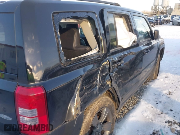 2014 Jeep Patriot Latitude with VIN 1C4NJPFAXED681859, listed as a IAAI auction lot 41271373 with 173,529 mi miles and . Bid and sale history available at DreamBid. Image 17.