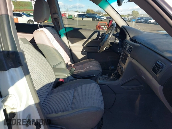 2003 Subaru Forester XS with VIN JF1SG65623H742223, listed as a IAAI auction lot 41713210 with 185,779 mi miles. Bid and sale history available at carsss.com. Image 5.