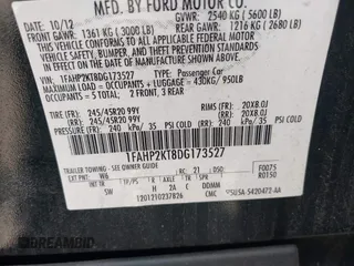 2013 Ford Taurus SHO z VIN 1FAHP2KT8DG173527, wystawiony jako IAAI lot #42198526 z przebiegiem 82 943 mil mil oraz . Historia ofert i sprzedaży dostępna na DreamBid. Obrazek 9.