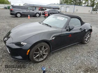 2021 Mazda MX-5 Miata Grand Touring with VIN JM1NDAD78M0455899, listed as a Copart auction lot 57347125 with 38,405 mi miles and Salvage title. Bid and sale history available at DreamBid. Image 1.