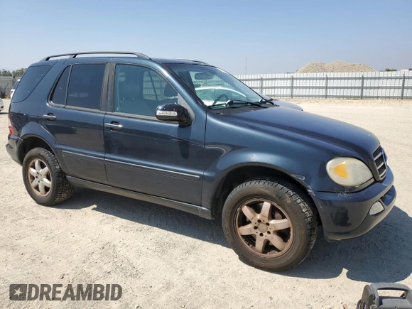 2002 Mercedes-Benz M-Class with VIN 4JGAB75E22A303060, listed as a Copart auction lot 63610284 with 192,968 mi miles and Salvage Title. Bid and sale history available at carsss.com. Image 4.