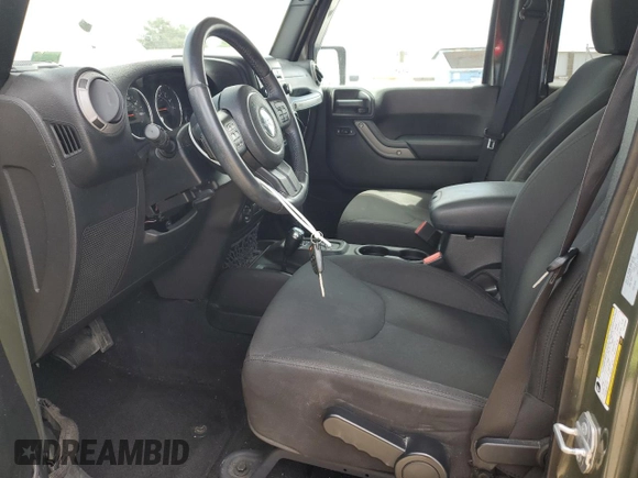 2015 Jeep Wrangler Unlimited Sport with VIN 1C4BJWDG4FL766904, listed as a Copart auction lot 58126555 with 68,400 mi miles and Salvage title. Bid and sale history available at DreamBid. Image 7.