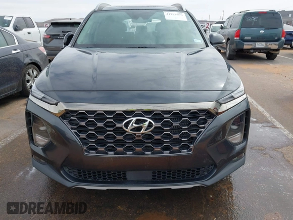 2020 Hyundai Santa Fe Limited with VIN 5NMS53AA8LH213608, listed as a IAAI auction lot 41787079 with 53,634 mi miles and . Bid and sale history available at DreamBid. Image 12.