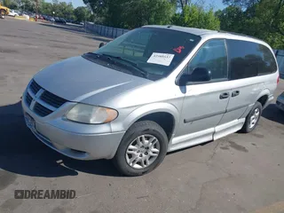 2007 Dodge Grand Caravan SE with VIN 1D4GP24R77B185034, listed as a IAAI auction lot 42503537 with 153,150 mi miles and . Bid and sale history available at DreamBid. Image 2.