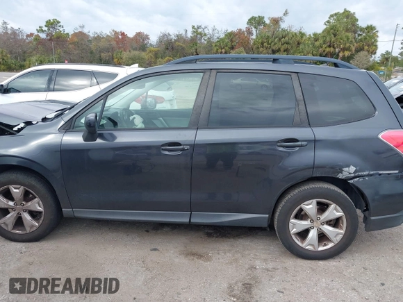 2015 Subaru Forester 2.5i Premium with VIN JF2SJADCXFG413237, listed as a IAAI auction lot 41339099 with 137,239 mi miles. Bid and sale history available at carsss.com. Image 15.
