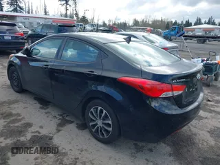 2012 Hyundai Elantra Limited with VIN KMHDH4AE1CU219215, listed as a IAAI auction lot 41956813 with 230,165 mi miles. Bid and sale history available at carsss.com. Image 3.