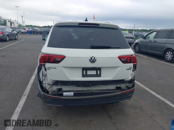 2018 Volkswagen Tiguan SEL with VIN 3VV2B7AX4JM012840, listed as a IAAI auction lot 42263511 with 105,510 mi miles and . Bid and sale history available at DreamBid. Image 16.