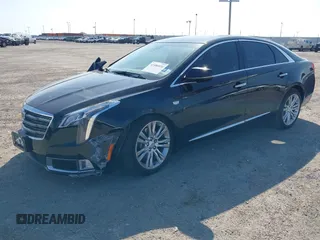 2018 Cadillac XTS Luxury with VIN 2G61M5S36J9120571, listed as a IAAI auction lot 41486816 with 77,302 mi miles. Bid and sale history available at carsss.com. Image 2.