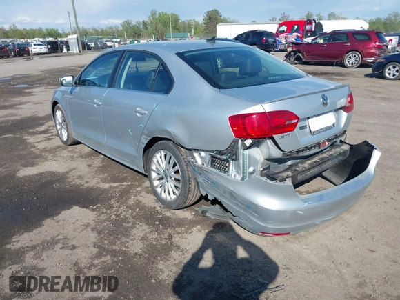 2014 Volkswagen Jetta TDI w/Premium with VIN 3VWLL7AJ2EM359341, listed as a IAAI auction lot 42030959 with 74,273 mi miles and . Bid and sale history available at DreamBid. Image 3.