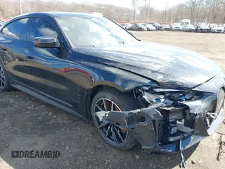 2024 BMW i4 xDrive40 z VIN WBY83FB04RFT19615, wystawiony jako IAAI lot #41679918 z przebiegiem 3 883 mil mil oraz . Historia ofert i sprzedaży dostępna na DreamBid. Obrazek 19.