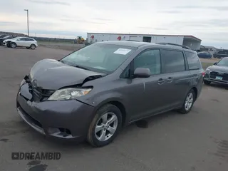 2011 Toyota Sienna LE AAS with VIN 5TDKK3DC3BS077857, listed as a IAAI auction lot 42099175 with 283,777 mi miles and . Bid and sale history available at DreamBid. Image 2.