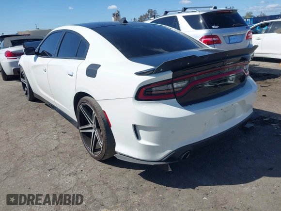 2019 Dodge Charger R/T with VIN 2C3CDXCT4KH681945, listed as a IAAI auction lot 41922885 with 73,769 mi miles and . Bid and sale history available at carsss.com. Image 3.