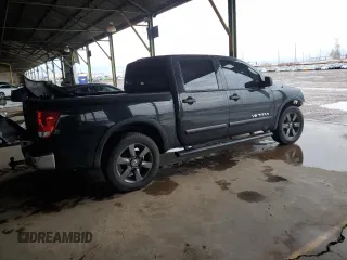 2015 Nissan Titan SL with VIN 1N6AA0ED1FN503994, listed as a Copart auction lot 39525224 with 104,353 mi miles and Salvage Title. Bid and sale history available at DreamBid. Image 3.