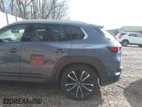 2023 Mazda CX-50 2.5 Turbo Premium Plus Package with VIN 7MMVABEY1PN101123, listed as a IAAI auction lot 41858602 with 34,541 mi miles. Bid and sale history available at carsss.com. Image 18.