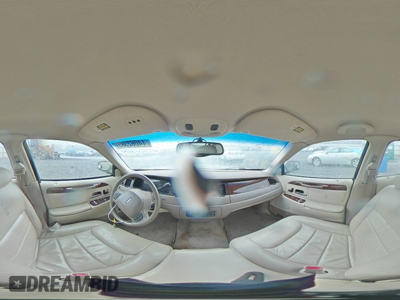 2000 Lincoln Town Car Signature with VIN 1LNHM82W2YY770068, listed as a Copart auction lot 44062385 with 109,941 mi miles and Salvage title. Bid and sale history available at DreamBid. Image 12.