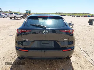 2023 Mazda CX-30 S with VIN 3MVDMBAM8PM548451, listed as a IAAI auction lot 41972170 with 36,379 mi miles and . Bid and sale history available at carsss.com. Image 16.