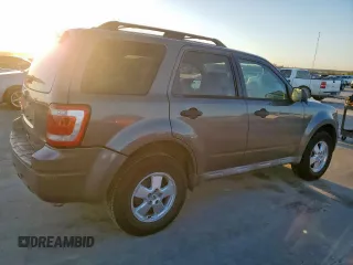 2011 Ford Escape XLT with VIN 1FMCU0D75BKC22917, listed as a Copart auction lot 48531065 with 198,854 mi miles and Salvage Title. Bid and sale history available at carsss.com. Image 3.