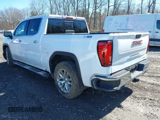 2019 GMC Sierra 1500 SLT z VIN 1GTU9DED3KZ116883, wystawiony jako IAAI lot #41828826 z przebiegiem 128 062 mil mil oraz . Historia ofert i sprzedaży dostępna na DreamBid. Obrazek 3.