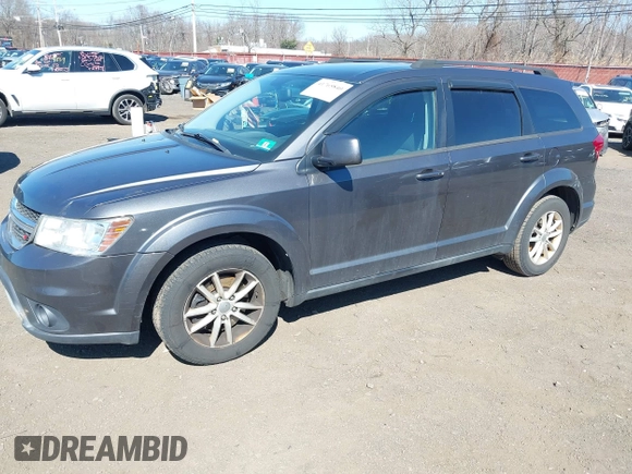 2014 Dodge Journey SXT with VIN 3C4PDCBB2ET156215, listed as a IAAI auction lot 41765840 with 129,737 mi miles and . Bid and sale history available at DreamBid. Image 2.