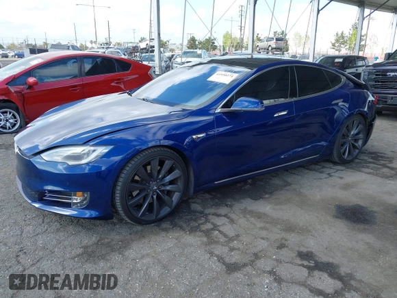 2016 Tesla Model S 90D with VIN 5YJSA1E22GF154873, listed as a IAAI auction lot 41950274 with 82,649 mi miles and . Bid and sale history available at DreamBid. Image 2.