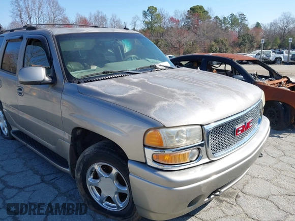 2002 GMC Yukon Denali z VIN 1GKEK63U82J341696, wystawiony jako IAAI lot #41772116 z przebiegiem 259 337 mil mil oraz . Historia ofert i sprzedaży dostępna na DreamBid. Obrazek 6.