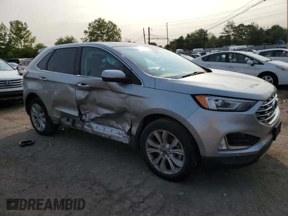 2021 Ford Edge Titanium with VIN 2FMPK4K91MBA12380, listed as a Copart auction lot 59275785 with 82,295 mi miles and Salvage title. Bid and sale history available at DreamBid. Image 4.