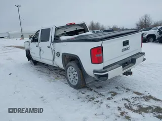 2015 GMC Sierra 2500HD available WiFi Denali with VIN 1GT120E88FF680538, listed as a IAAI auction lot 41571684 with 125,147 mi miles. Bid and sale history available at carsss.com. Image 3.