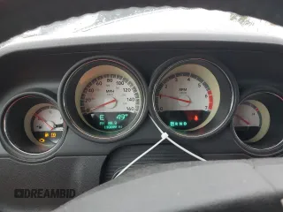 2010 Dodge Challenger R/T z VIN 2B3CJ5DT8AH241086, wystawiony jako Copart lot #80115224 z przebiegiem 110 689 mil mil oraz Szkoda całkowita • Salvage title. Historia ofert i sprzedaży dostępna na DreamBid. Obrazek 9.